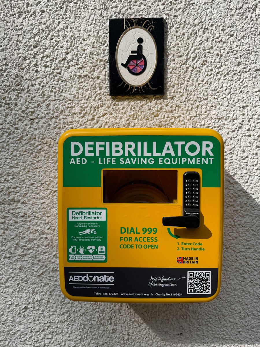 Close-up of a public defibrillator box in Swindon, England. Essential life-saving equipment.